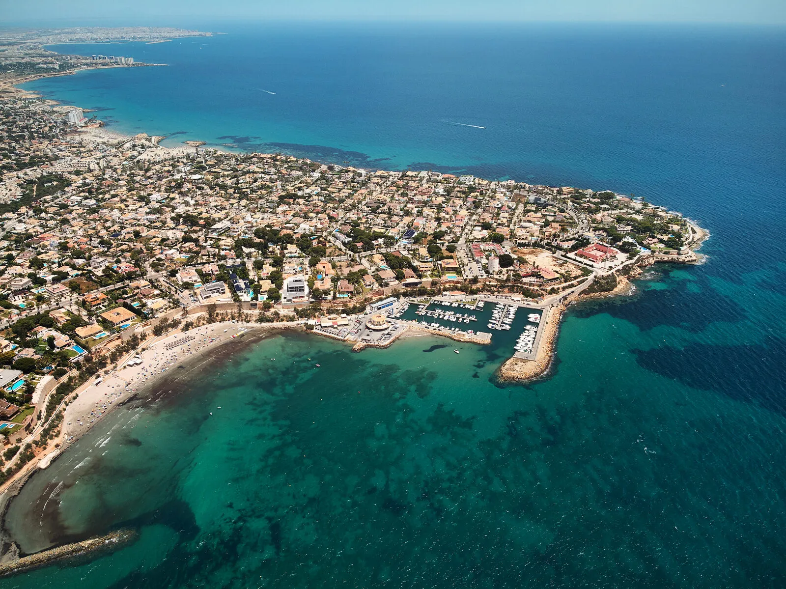 Aerial view of the Orihuela Costa coastline with the Cabo Roig marina on the Costa Blanca